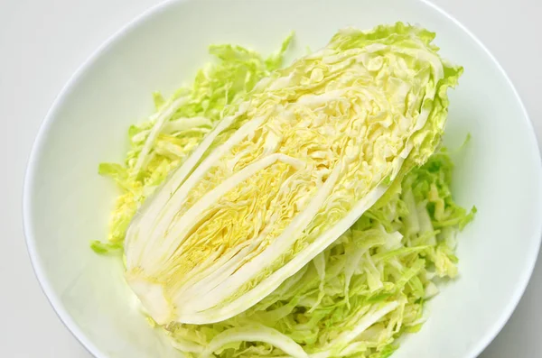 Chinese cabbage salad on white background. Vegan food. — Stock Photo, Image
