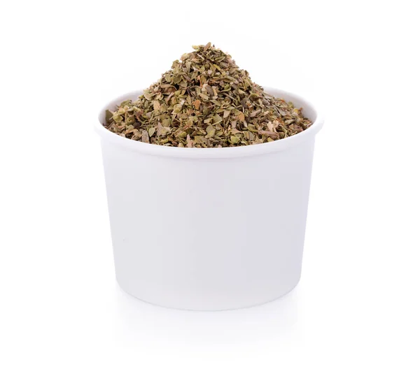 Dried Oregano on white paper cup — Stock Photo, Image