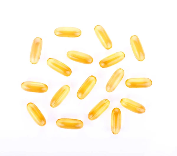 Fish oil pill on white background Royalty Free Stock Photos