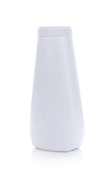 Weiße Plastikflasche auf weißem Hintergrund — Stockfoto