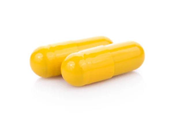 Pillen capsules geïsoleerd op witte achtergrond — Stockfoto