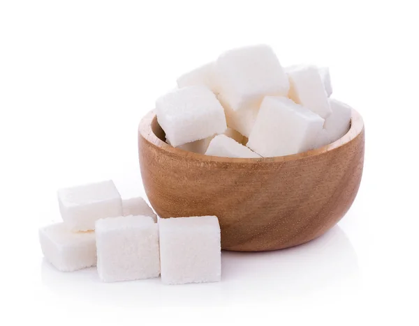 Cubo de azúcar sobre fondo blanco — Foto de Stock