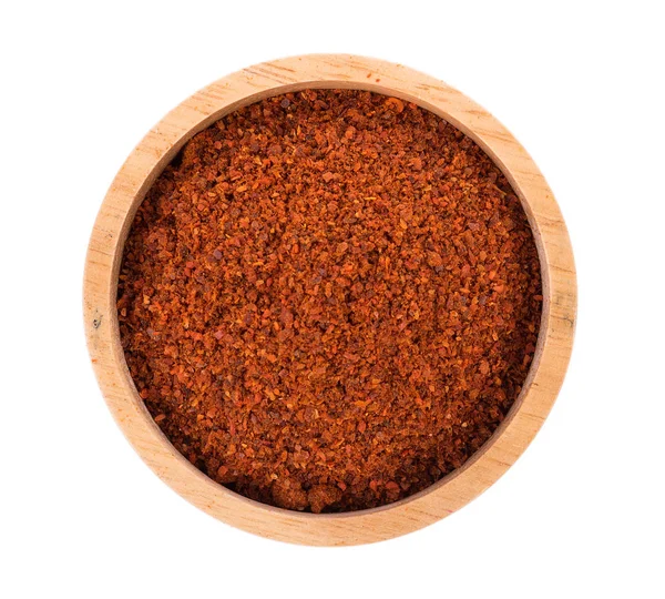 Pile of red paprika powder in bowl isolated background — 스톡 사진