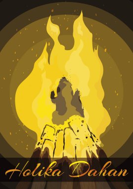 Holika heykelinin Hindistan 'daki Holika Dahan etkinliği sırasında yanarak kül oluşunu temsil eden seremoni odunu..