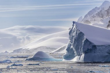 Icebergs and Western Antarctic Peninsula clipart