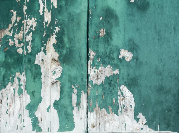 Rustic and weathered turquoise colored paint on wood panel — Stock Photo, Image