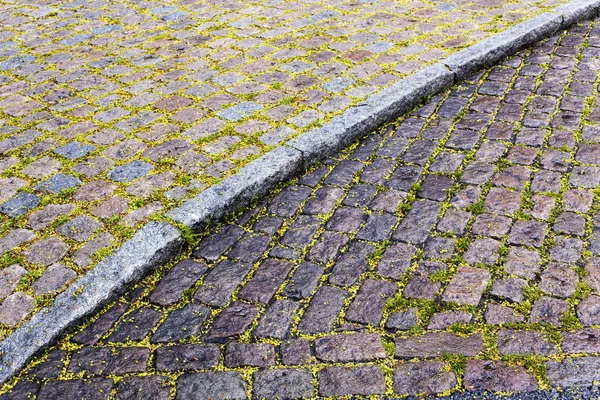 Cobblestone road and pavement — Stock Photo, Image