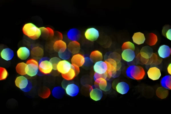 Luces de colores brillantes fondo negro — Foto de Stock