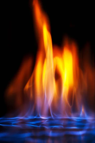 Multi-colored flame of burning alcohol — Stock Photo, Image