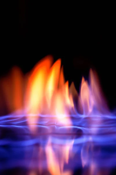 Multi-colored flame of burning alcohol — Stock Photo, Image