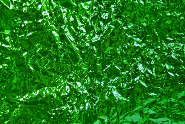 Hintergrund aus mintgrüner, heller Folie — Stockfoto