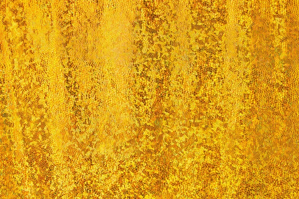 Textura dourada do fundo da pele — Fotografia de Stock