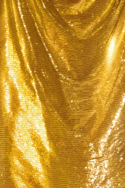 Golden sequins - sparkling sequined textile — Stock Photo, Image
