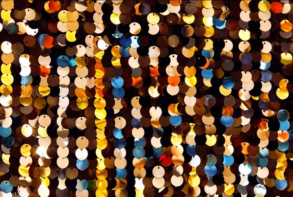 Různobarevné flitry na tkaniny — Stock fotografie