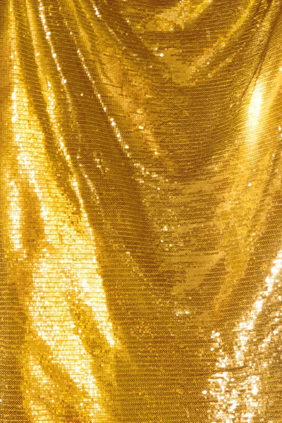 Golden sequins - sparkling sequined textile — Stock Photo, Image