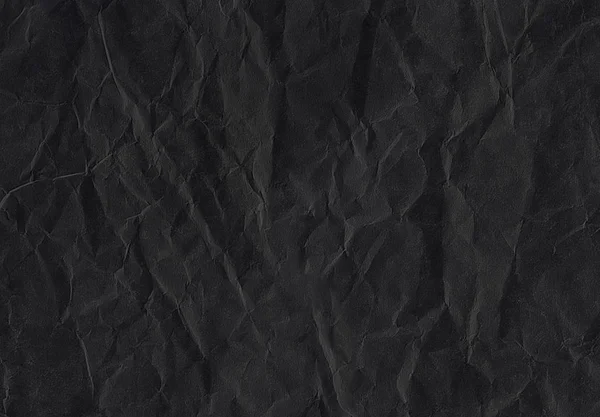 Crumpled black paper poster. Texture. Abstract background.