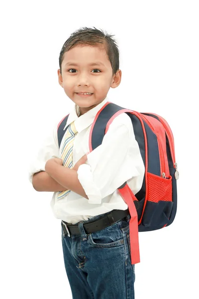 小学生男孩与背包 免版税图库图片