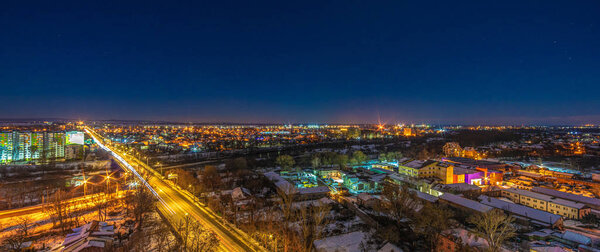 Panorama of the night Ukrainian city in winter from a height