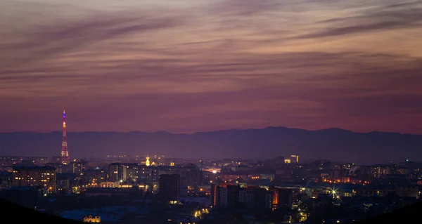 Panorama nocturno de la ciudad en invierno —  Fotos de Stock