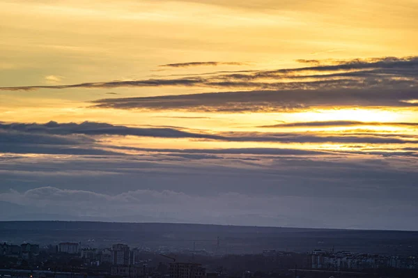 Clouds in the sunset sky in spring — Stock Photo, Image