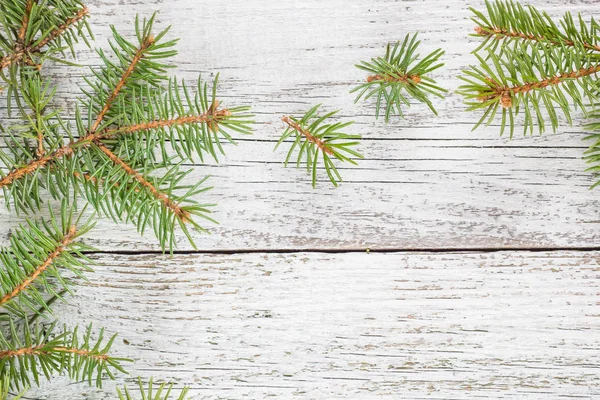 Fondo de madera de Navidad con abeto. Espacio de copia vista superior — Foto de Stock