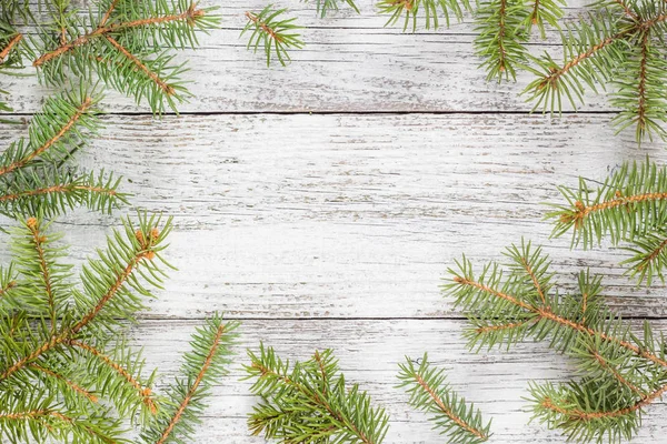 Fondo de madera de Navidad con abeto. Espacio de copia vista superior —  Fotos de Stock