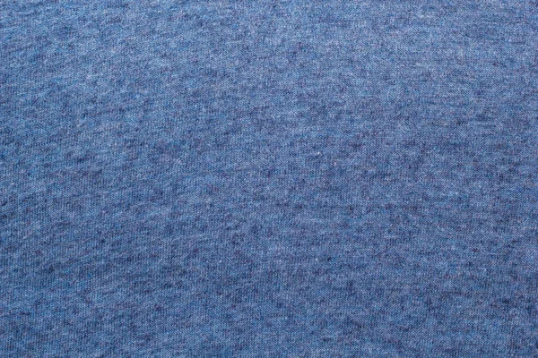 Texturen på ett stickat ulltyg blått — Stockfoto