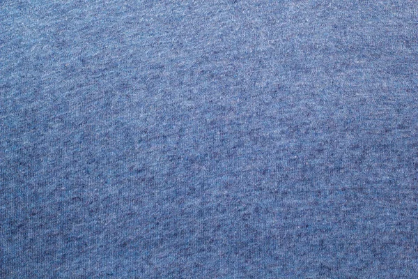 Texturen på ett stickat ulltyg blått — Stockfoto
