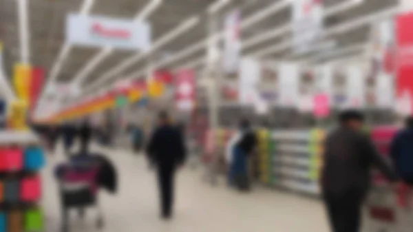 Blurred image of people in shopping mall with bokeh — Stock Photo, Image