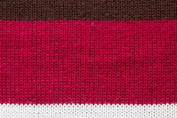 Фон текстури нитки светр, багатобарвні передні петлі вовняної пряжі в'язаний фон — стокове фото