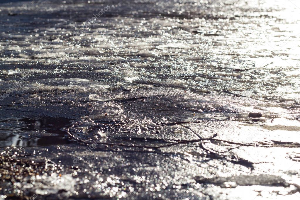 abstract reflections in melting the icy cobblestones