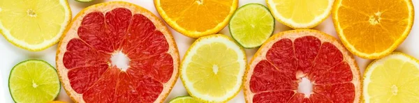 Top view of slices of citrus fruits — Stock Photo, Image