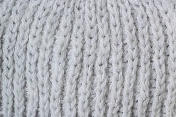 セーターやスカーフ パターンの白ニット生地のテクスチャ背景 — ストック写真