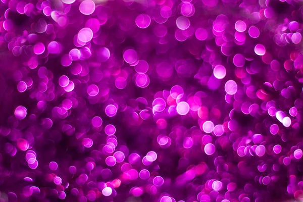 Purple shiny glitter holiday beautiful abstract blur bokeh background — Stock Photo, Image