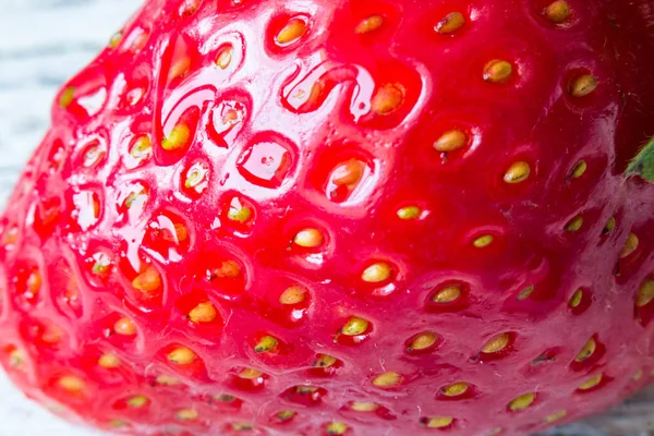 Macro estremo di consistenza di fragola rossa per sfondo — Foto Stock