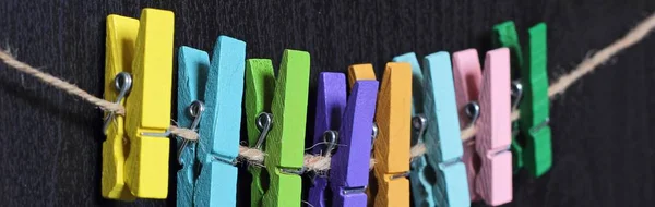 Banner Small Colored Clothespins Rope Black Background — Stock Photo, Image