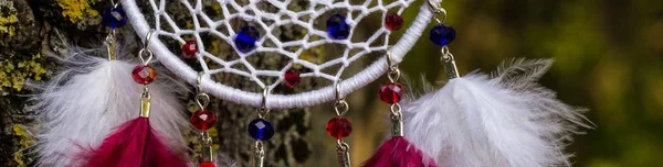 Banner of Handmade dream catcher with feathers threads and beads rope hanging — Stock Photo, Image
