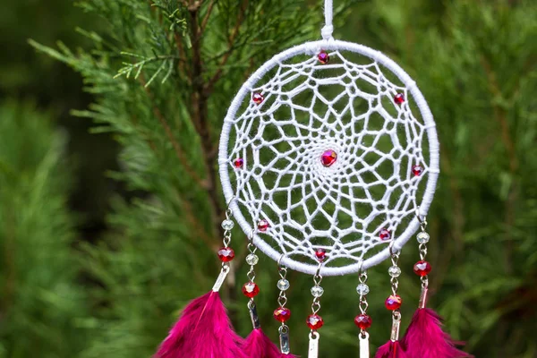 Handmade dream catcher with feathers threads and beads rope hanging