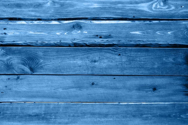 Superficie in legno nel classico colore blu alla moda. sfondo. Colore dell'anno 2020 . — Foto Stock