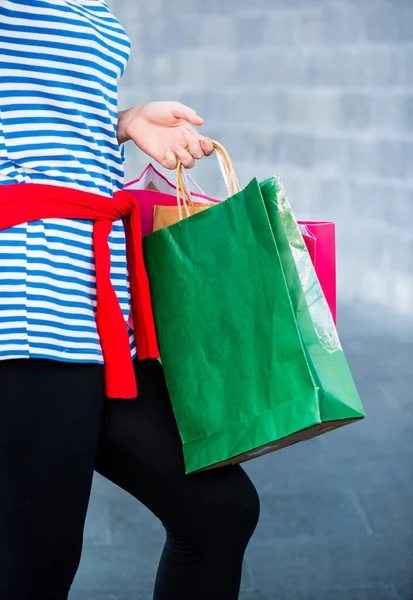 Shopping gift and present on holiday for New Year and Birthday party.Teenager woman holding shopping bags