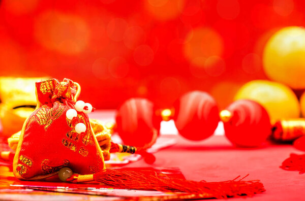 Китайский Новый год, китайские золотые слитки и традиционный китайский стиль
