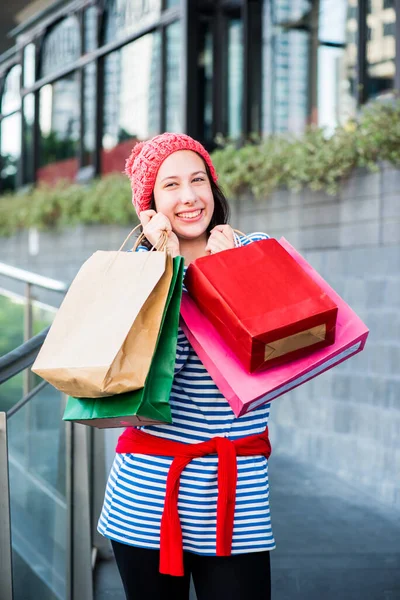 Shopping gift and present on holiday for New Year and Birthday party.Teenager woman holding shopping bags