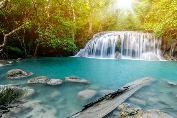 beautiful waterfall in the forest. Travel and vacation at Thailand.