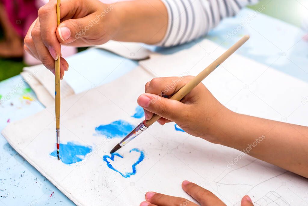 Education, Mixing Water Colors in a painting Class