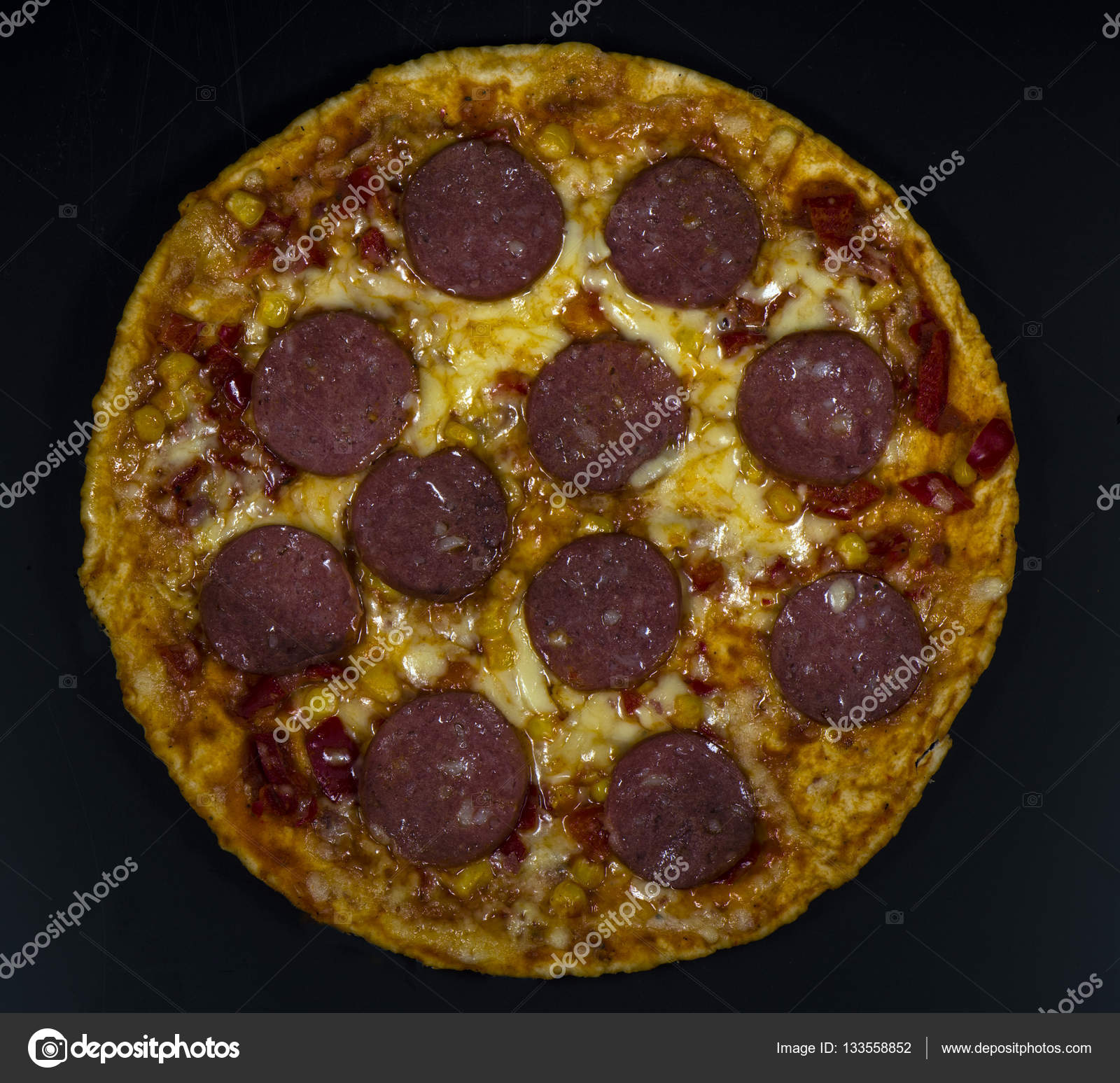 Pizza with salami and cheese ⬇ Stock Photo, Image by © Nikolaskus
