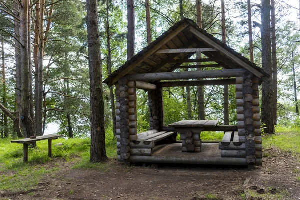 Wooden gazebo in the woods — Stock Photo, Image