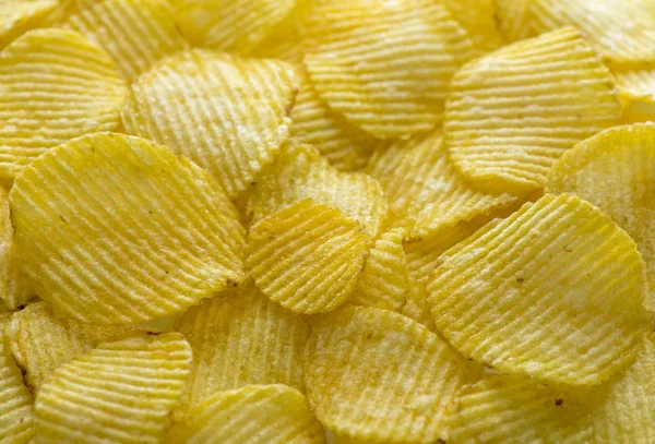 Bakgrund av stekt chips — Stockfoto