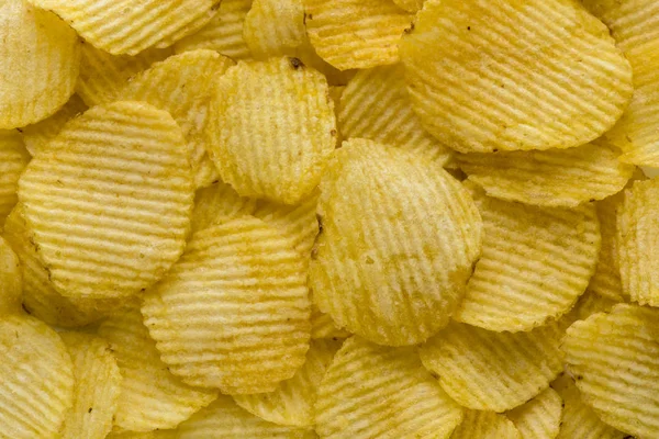 Bakgrund av stekt chips — Stockfoto