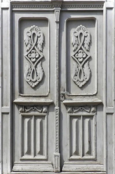 Stare drewniane drzwi wzorzyste — Zdjęcie stockowe