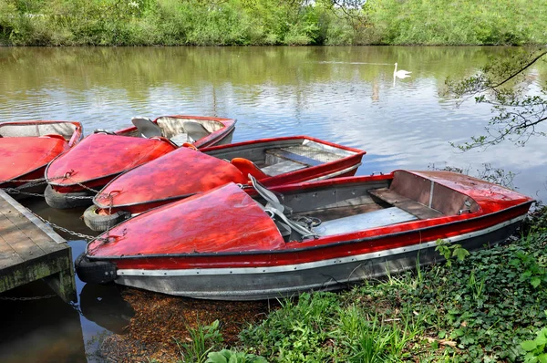 Red boats on the river — Stock Photo, Image